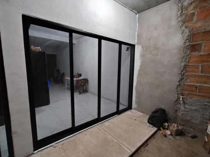 Four-panel black aluminum sliding enclosure