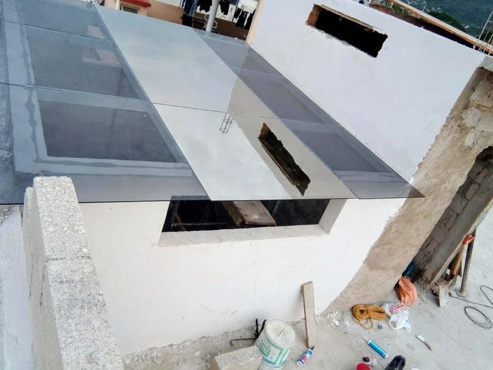 Tinted glass skylight over a stairwell