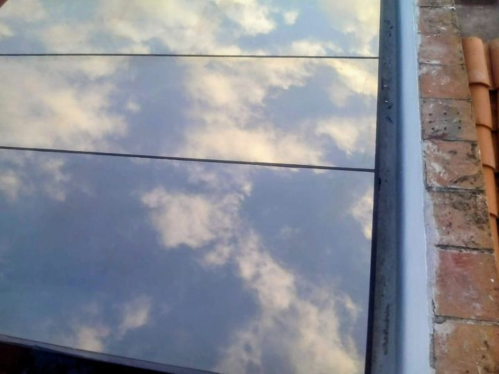 Glass skylight reflecting the sky